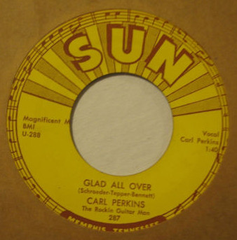 Accords et paroles Glad All Over Carl Perkins