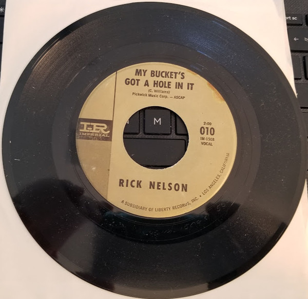 Accords et paroles My Buckets Got A Hole In It Ricky Nelson