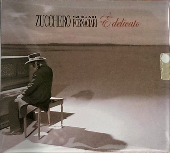 Accords et paroles E Delicato Zucchero